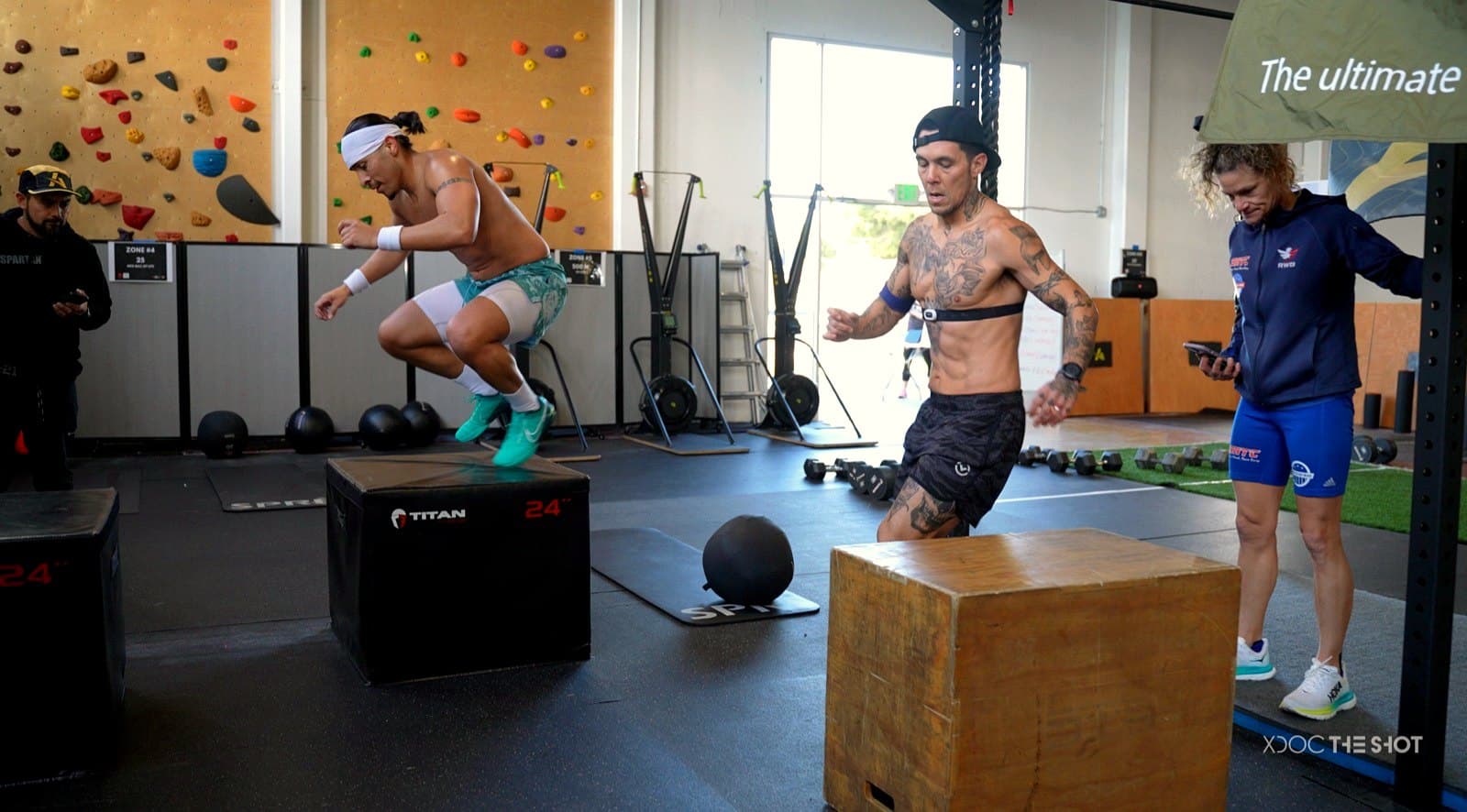 Members hitting box jumps and burpees across the APX Velocity training floor